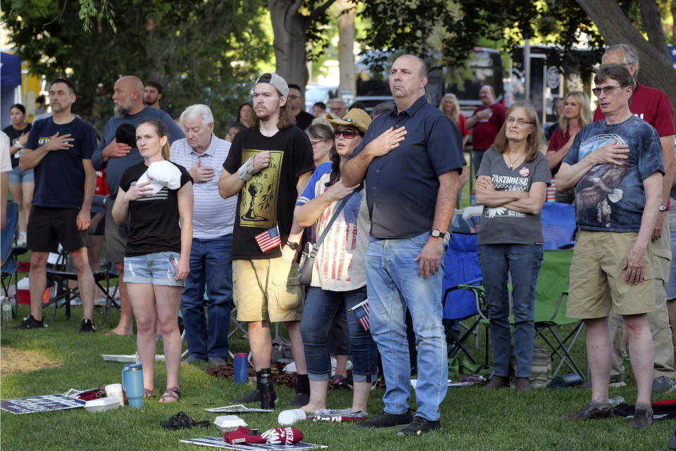 Republican voters attend a rally for Trump-backed U.S. Senate candidate Trent Staggs and others on June 14, 2024, in Orem, Utah. Tuesday's primary election will determine if the state wants another moderate conservative like Romney or a farther-right candidate more willing to fall in line with former President Donald Trump. (AP Photo/Rick Bowmer)