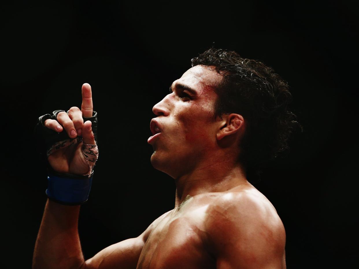 Charles Oliveira (pictured) faces Michael Chandler for the vacant UFC lightweight title (Getty Images)