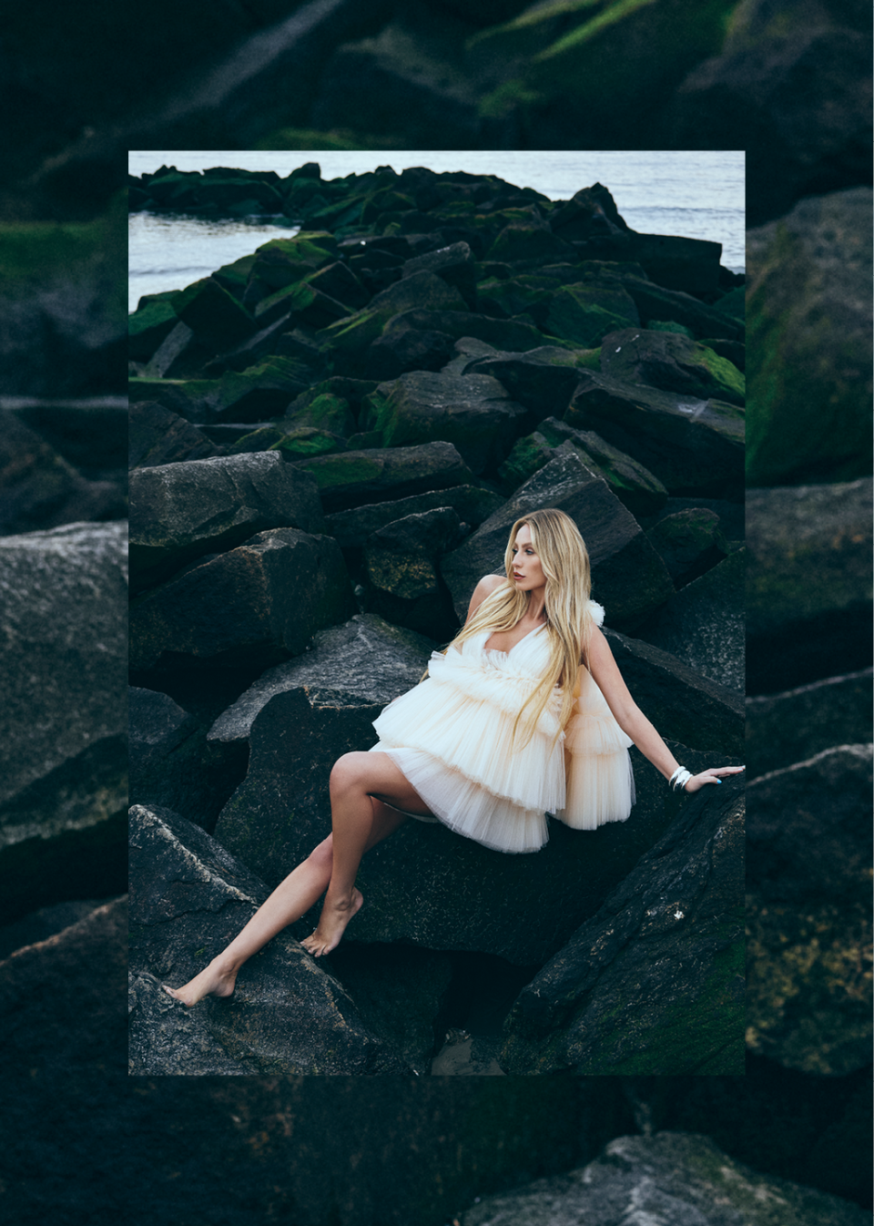 a person sitting on a rock