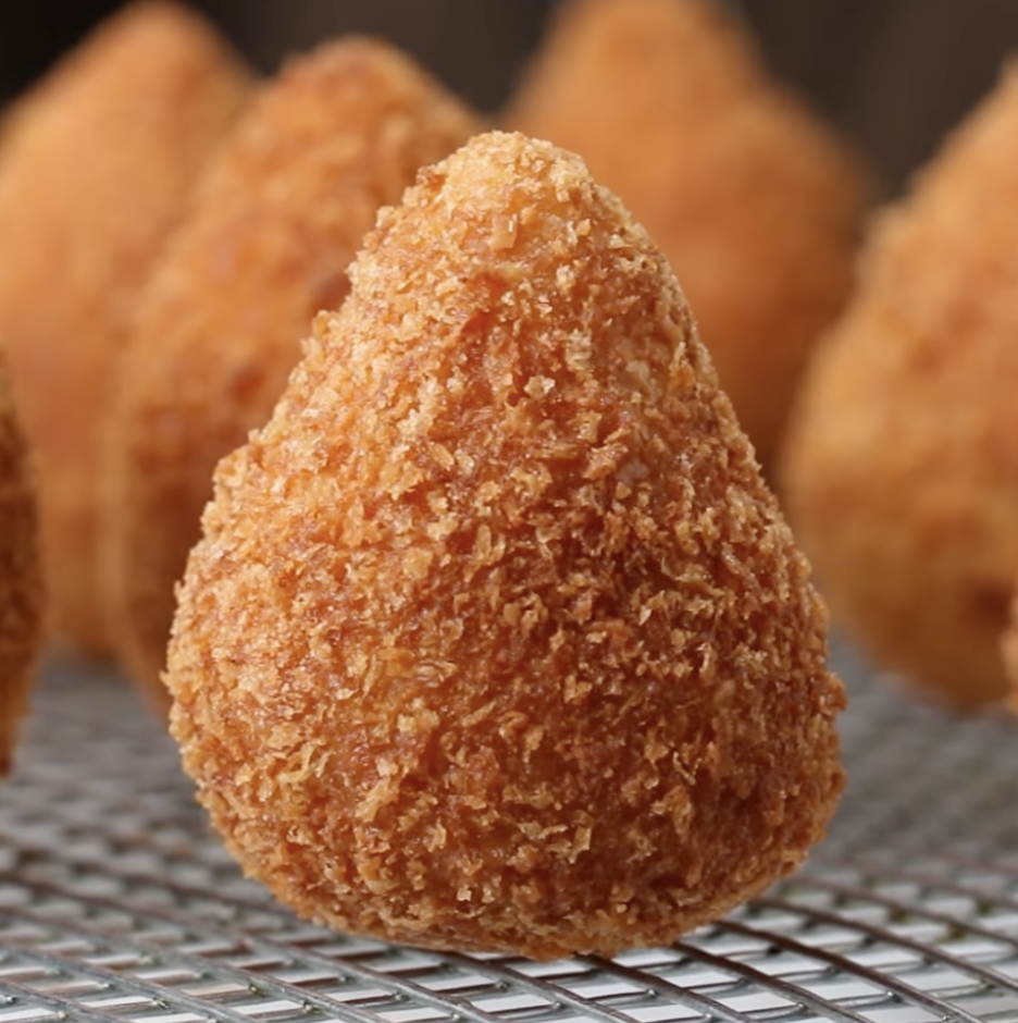 A close-up of a coxinha