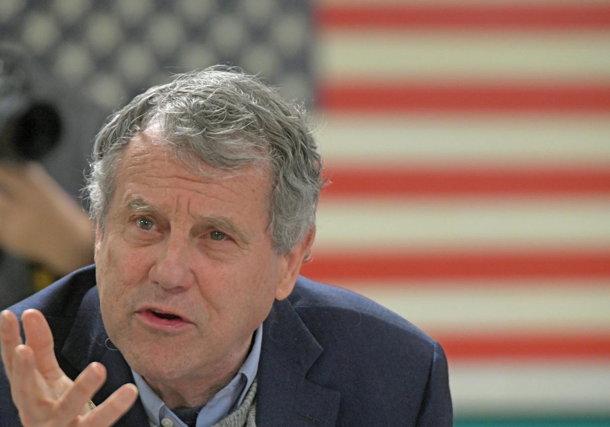 Sen. Sherrod Brown asks a question Wednesday morning while meeting with local veterans.
