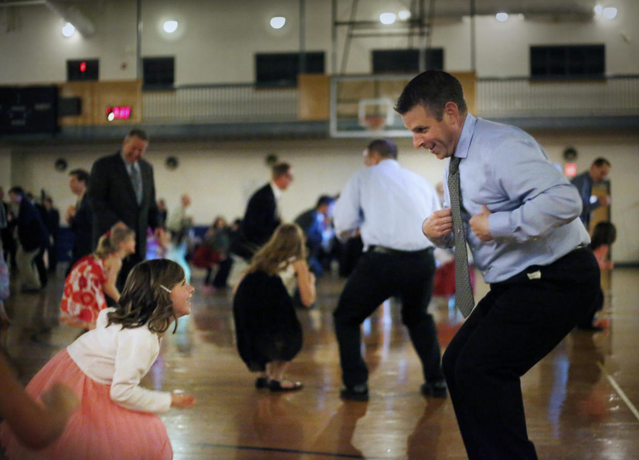 A father, Scott Corbett, and his daughter Nia, 6, at a father/daughter dance in South Portland. (Photo by Derek Davis/Staff Photographer)
