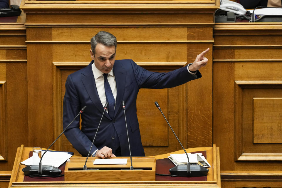 Greece Prime Minister Kyriakos Mitsotakis speaks during a parliament session in Athens, on Thursday, March 28, 2024. A Greek opposition party Tuesday submitted a motion of no-confidence against the government, saying that it tried to cover up its responsibility over a deadly rail disaster last year that shocked Greece. The three-day debate in parliament is due to end with a vote late Thursday. March 28. (AP Photo/Petros Giannakouris)