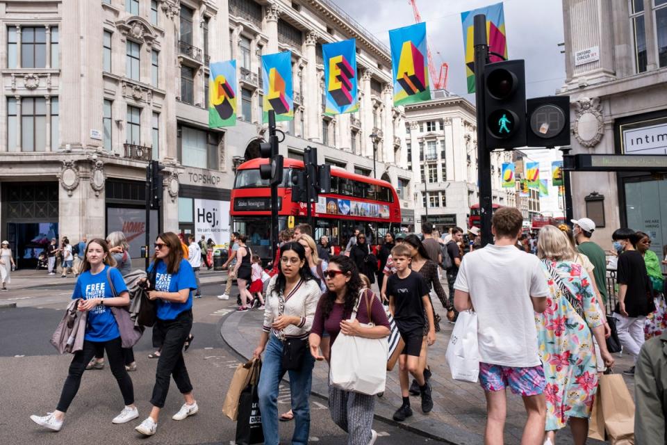 Shoppers on Oxford Street (In Pictures via Getty Images)