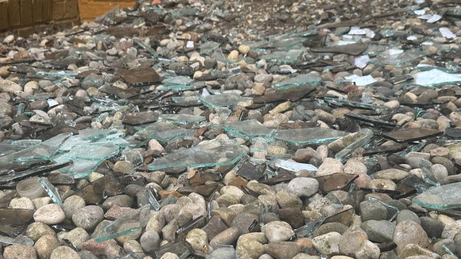 Shattered glass outside Days Inn and Suites on Airview Boulevard off of Portage Road in Kalamazoo. (March 25, 2024)