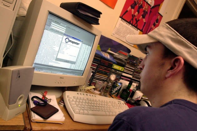 A New York University student downloads music from the Napster in 2001. - Credit: Spencer Platt/Newsmakers/Getty Images