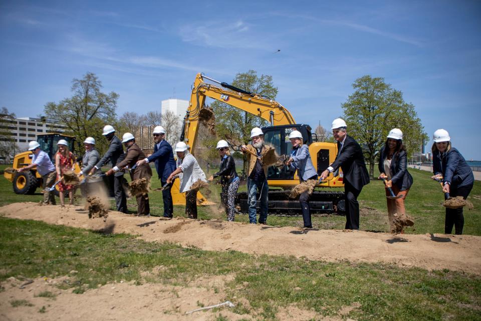 Leaders and speakers break ground at the Ralph C. Wilson, Jr. Centennial Park groundbreaking along Detroit's West Riverfront on Tuesday, May 10, 2022.