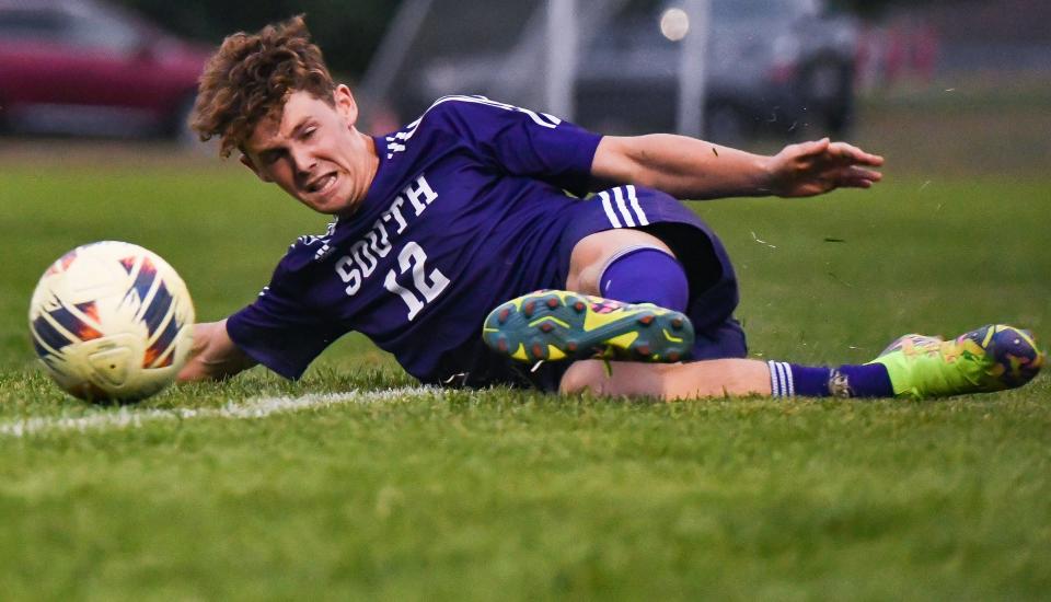 Bloomington South’s Easton Figert (12) keeps the ball in play during the IHSAA Boys’ soccer sectional match against Martinsville at Terre Haute South on Wednesday, Oct. 4, 2023.