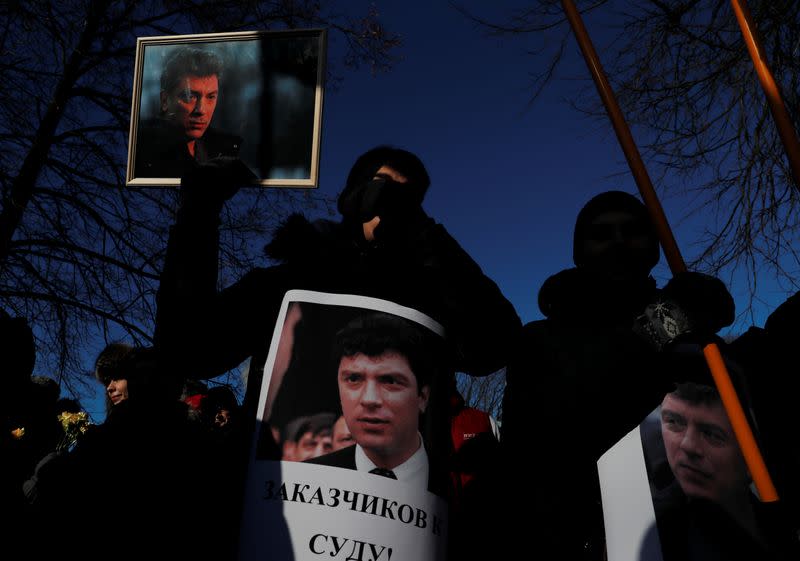 People take part in a rally marking the 5th anniversary of Russian opposition politician Boris Nemtsov's murder, in Saint Petersburg