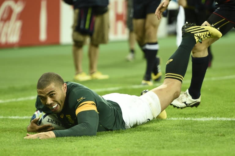 South Africa's wing Bryan Habana scores his third and his team's seventh try during a Pool B match of the 2015 Rugby World Cup against USA at the Olympic Stadium, east London, on October 7, 2015