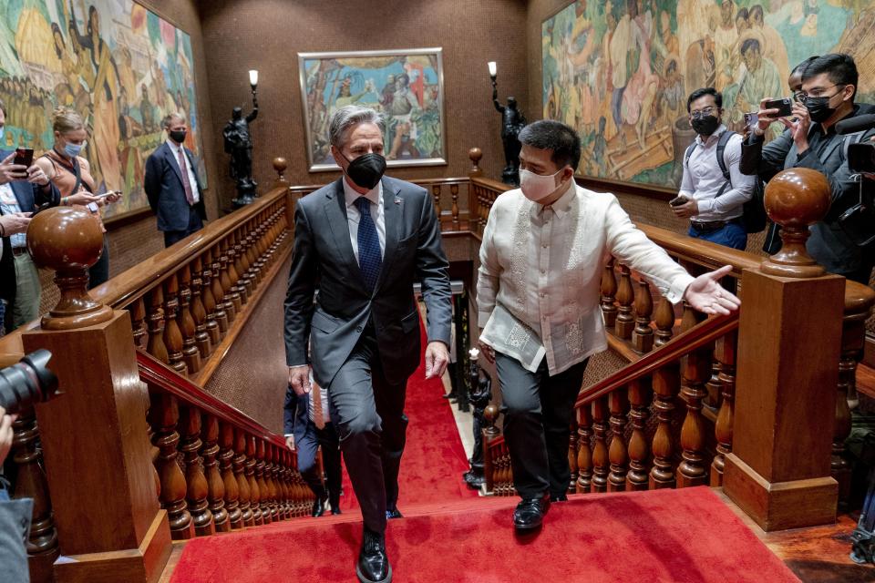 Secretary of State Antony Blinken, center left, arrives for a meeting with Philippine President Ferdinand Marcos Jr. at the Malacanang Palace in Manila, Philippines, Saturday, Aug. 6, 2022. Blinken is on a ten day trip to Cambodia, Philippines, South Africa, Congo, and Rwanda. (AP Photo/Andrew Harnik, Pool)