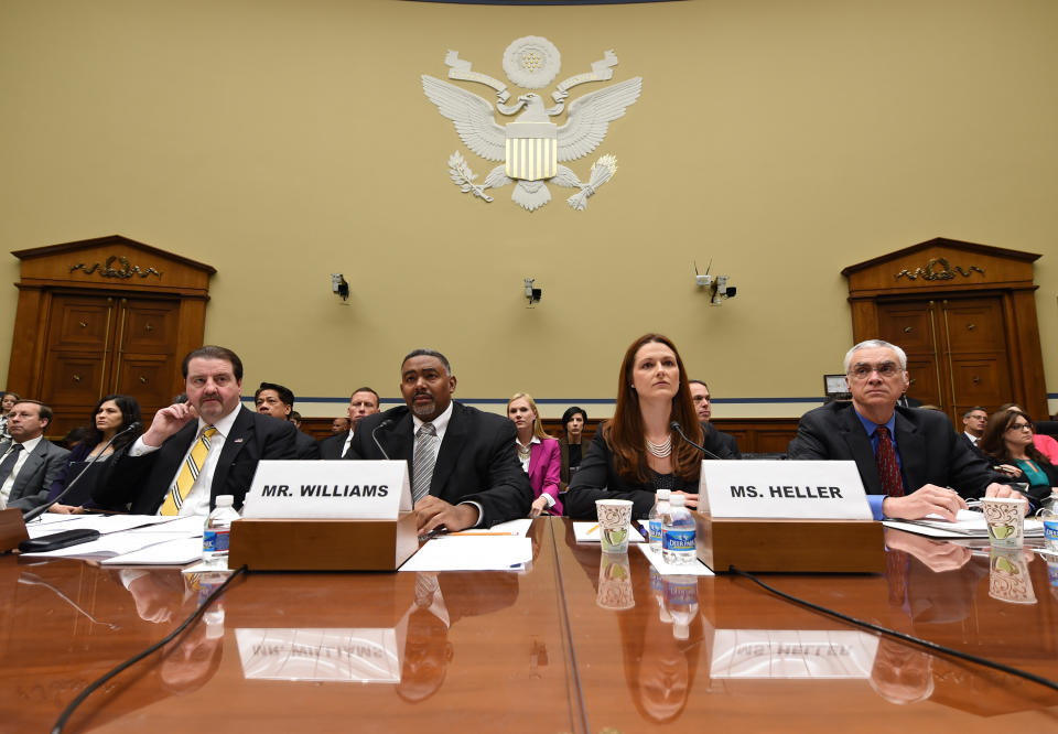Witnesses listen to opening remarks before testifying before the House Oversight and Government Reform full committee hearing, Wednesday, May 7, 2014, in Washington. Shown from left are Patrick Sullivan, Assistant Inspector General for Investigations, Office of Inspector General, EPA, Allan Williams, Deputy Assistant Inspector General for Investigations, Office of Inspector General, EPA, Elisabeth Heller Drake, Special Agent, Office of Investigations, Office of Inspector General, EPA and Bob Perciasepe, Deputy Administrator, EPA. (AP Photo/Molly Riley)