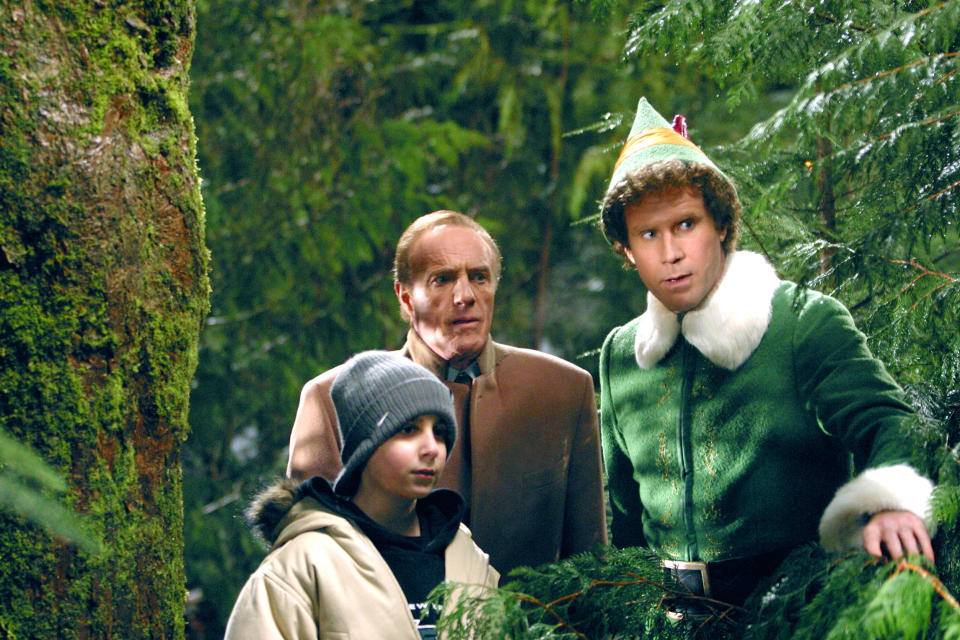 Michael, Walter, and Buddy the Elf in the woods