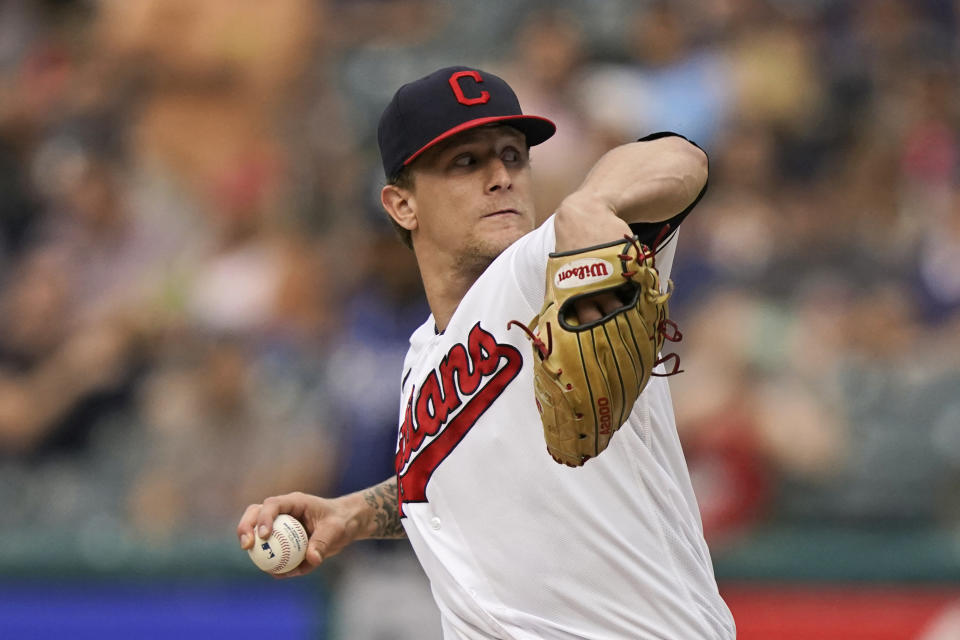 Cleveland Indians starting pitcher Zach Plesac delivers in the first inning of the team's baseball game against the Tampa Bay Rays, Friday, July 23, 2021, in Cleveland. (AP Photo/Tony Dejak)