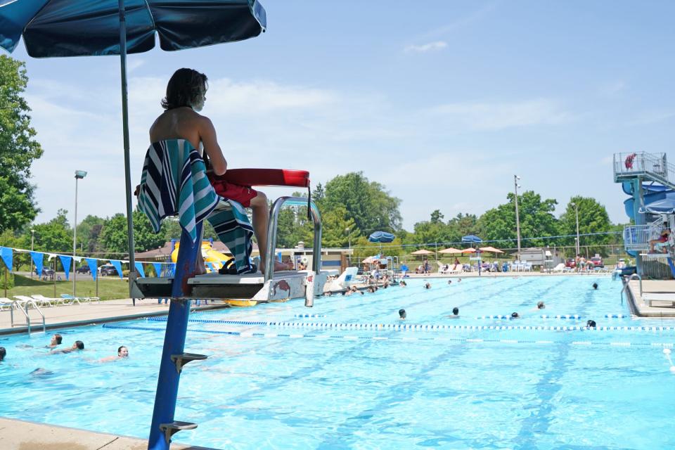 Zane Watkins of Adrian is in his second season as a lifeguard at Adrian's Bohn Pool. Here, he watches over the community pool Wednesday during last week's heat wave.