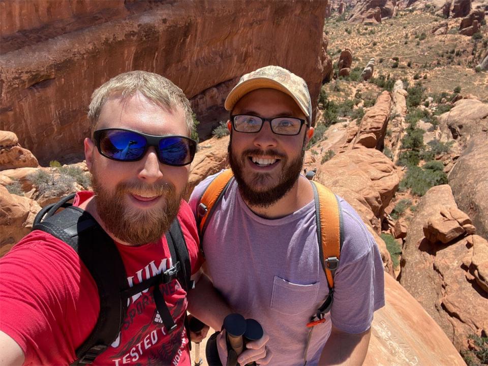 Timothy Moore and husband trent selfie in american southwest