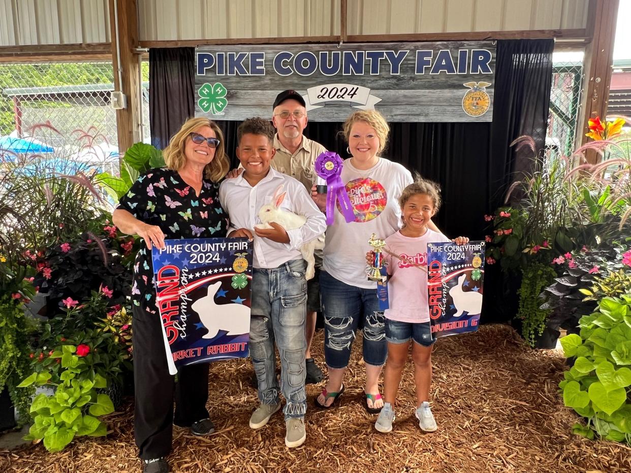 2024 Grand Champion rabbit exhibitor Khalil Thompson celebrates with his grandparents Tonya and Lou Thompson, who are both FBP employees. This is Khalil’s second Grand Champion win.