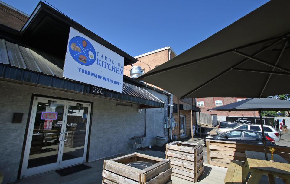 The exterior and outdoor dining area at Carolina Kitchen on Campbell Street in Shelby Thursday morning, May 16, 2024.