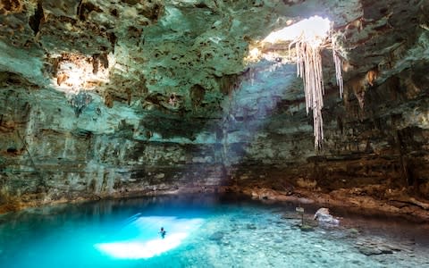 A cenote in Mexico - Credit: Getty Images