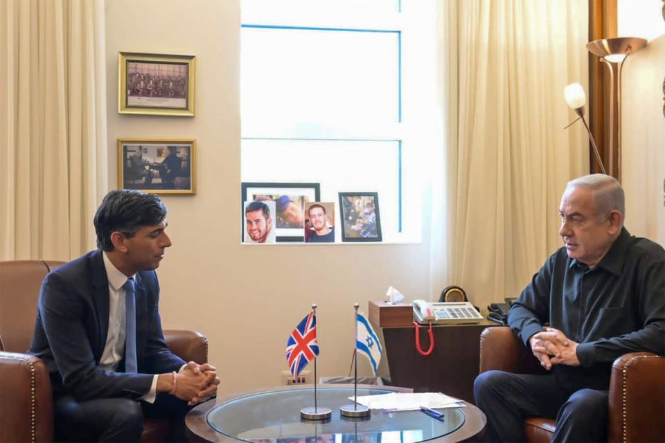 Rishi Sunak speaks to Israeli PM Benjamin Netanyahu during a visit in mid-October (EPA)