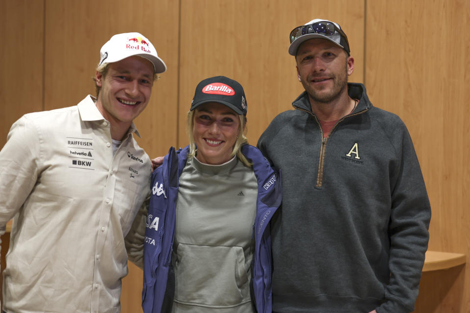 Switzerland's Marco Odermatt, United States' Mikaela Shiffrin and former US skier Bode Miller pose ahead of the alpine ski season's opening races, in Soelden, Austria, Friday, Oct. 27, 2023. (AP Photo/Alessandro Trovati)