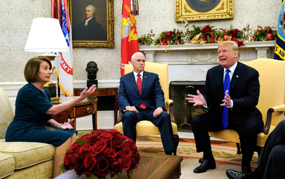 Pelosi and Trump argue as Pence looks on during the heated debate at the White House. (Photo: Kevin Lamarque/Reuters)