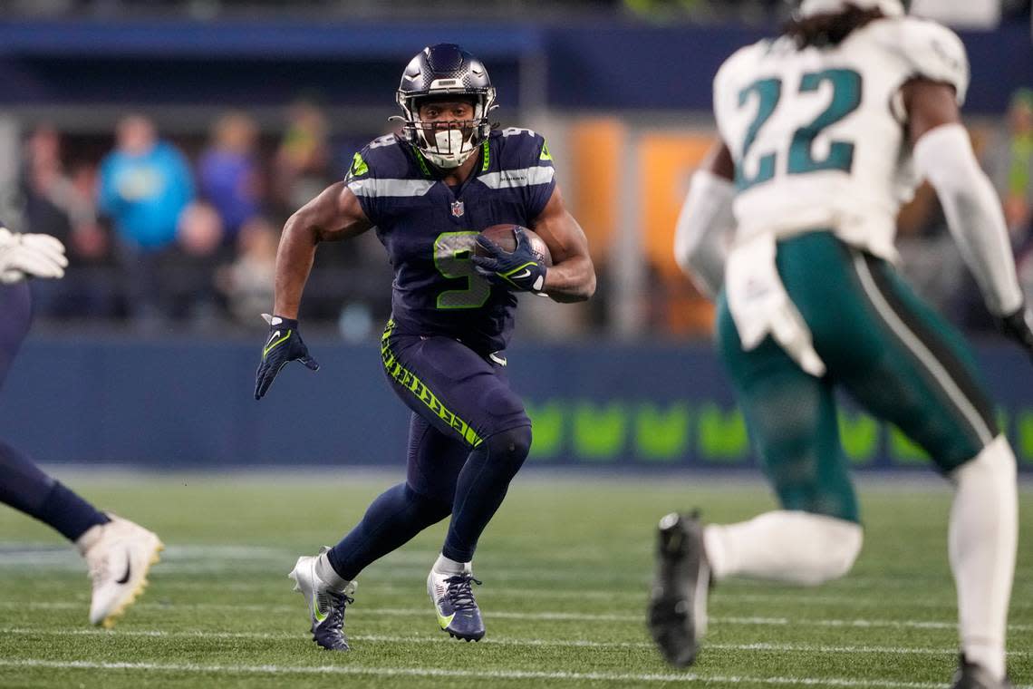 Seattle Seahawks running back Kenneth Walker III runs with the ball against the Philadelphia Eagles during the first half of an NFL football game, Monday, Dec. 18, 2023, in Seattle. (AP Photo/Lindsey Wasson)