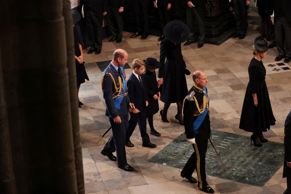 Prince William, Princess Kate, Prince George and Princess Charlotte arrive for the funeral of Queen Elizabeth II on Sept. 19, 2022.