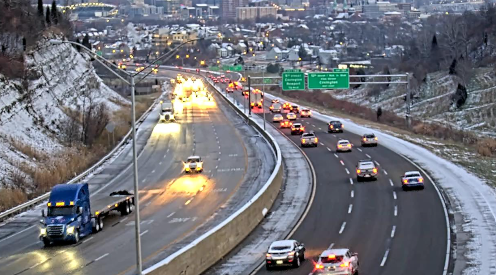 Traffic flows on I-71/75 at the Cut-in-the-Hill in Northern Kentucky. Several schools are closed today due to slick road conditions