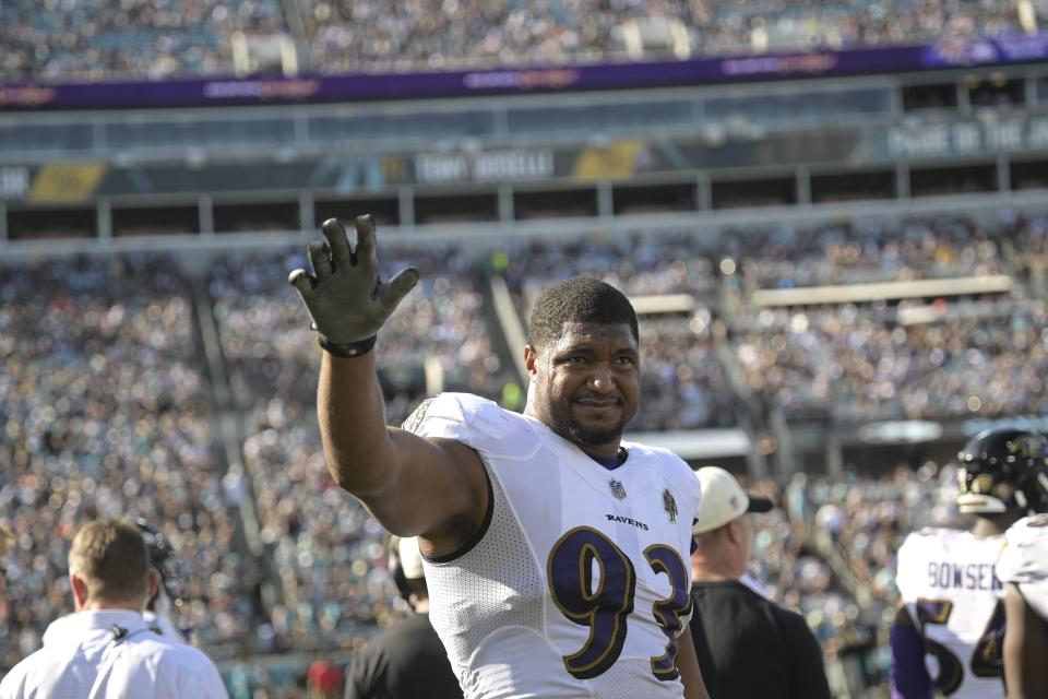 Baltimore Ravens defensive tackle Calais Campbell (93) waves to fans during the first half of an NFL football game against former team Jacksonville Jaguars, Sunday, Nov. 27, 2022, in Jacksonville, Fla. (AP Photo/Phelan M. Ebenhack)