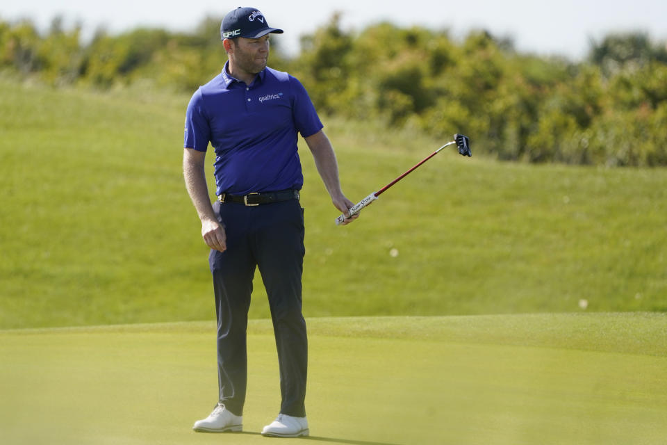 Branden Grace, of South Africa, watches a putt on the sixth hole during the second round of the PGA Championship golf tournament on the Ocean Course Friday, May 21, 2021, in Kiawah Island, S.C. (AP Photo/Chris Carlson)