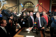 Same-sex couple Karl Kreil and Bodo Mende get married at a civil registry office, becoming Germany's first married gay couple after German parliament approved marriage equality in a historic vote this past summer, in Berlin, Germany October 1, 2017. REUTERS/Axel Schmidt