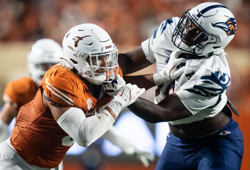 Trey Moore, left, has seen his pressure rate decline since joining Texas, but he's hoping to take advantage of a sometimes-leaky Mississippi State offensive line.