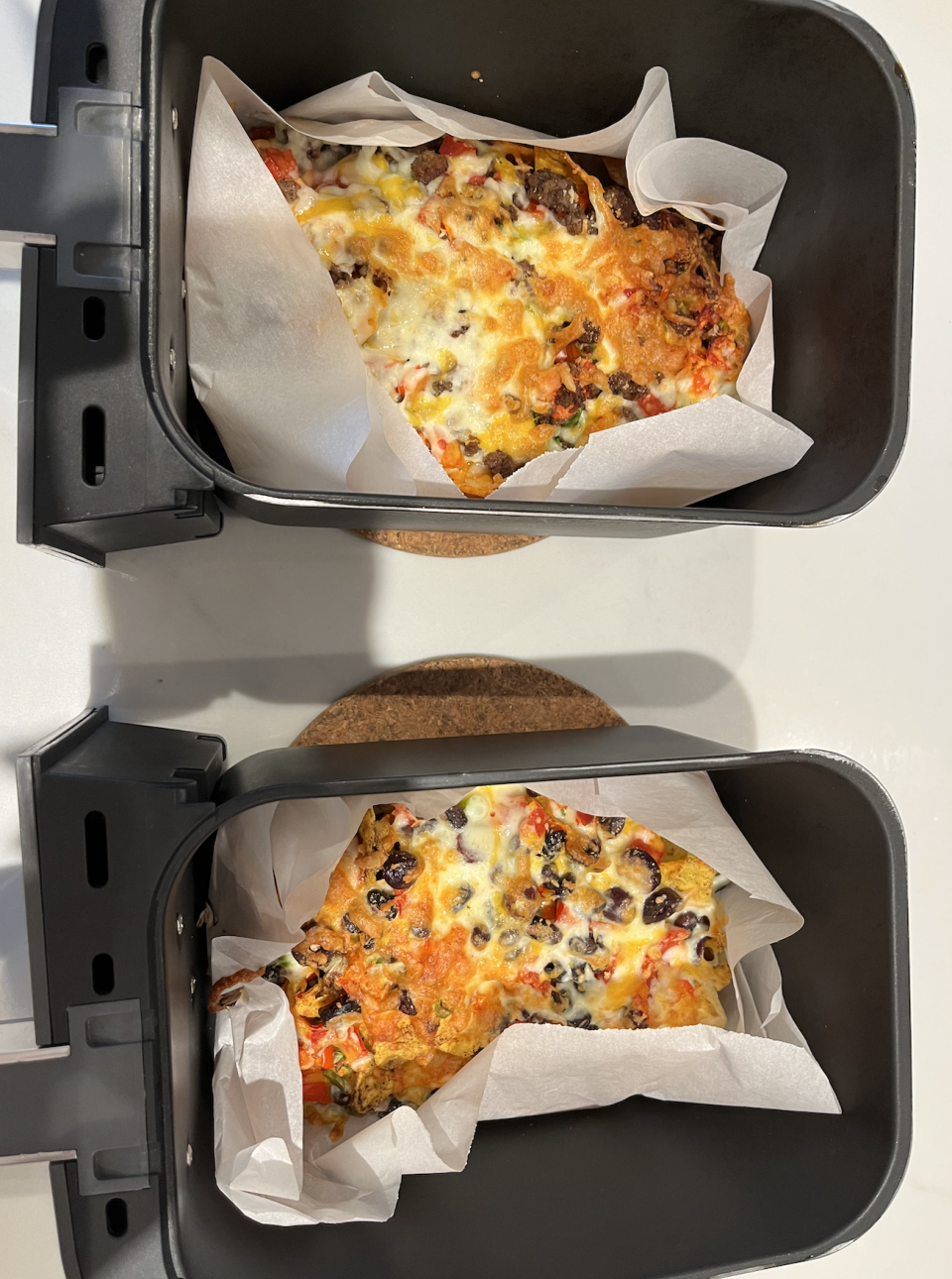 Top: Beef Nachos, Bottom: Veggie Nachos (Samantha Vecchiarelli)