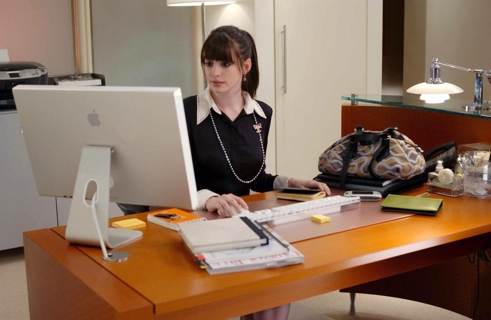 Andy sitting at her desk