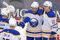 Buffalo Sabres' Drake Caggiula (91) celebrates his goal during the first period of an NHL hockey game against the Pittsburgh Penguins in Pittsburgh, Thursday, May 6, 2021.(AP Photo/Gene J. Puskar)