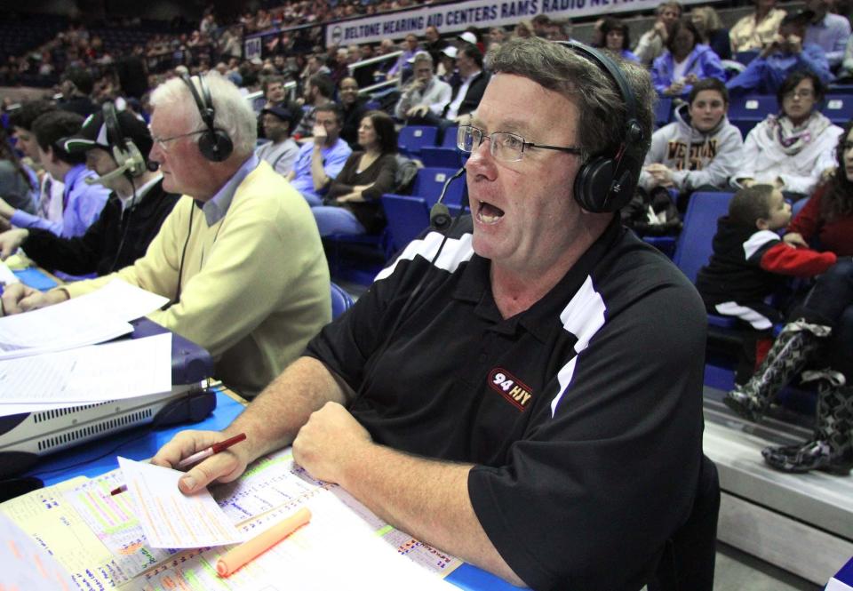 Don Kaull, left, broadcasts a URI-Saint Louis basketball game at the Ryan Center in February 2012 with Steve McDonald.