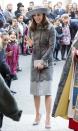 <p>London-based designer Erdem was the man behind Kate’s lacy grey coat. For a service at Westminster Abbey, the Duchess accessorised with suede Rupert Sanderson heels and a wide-brimmed hat by John Boyd. </p><p><i>[Photo: PA]</i></p>