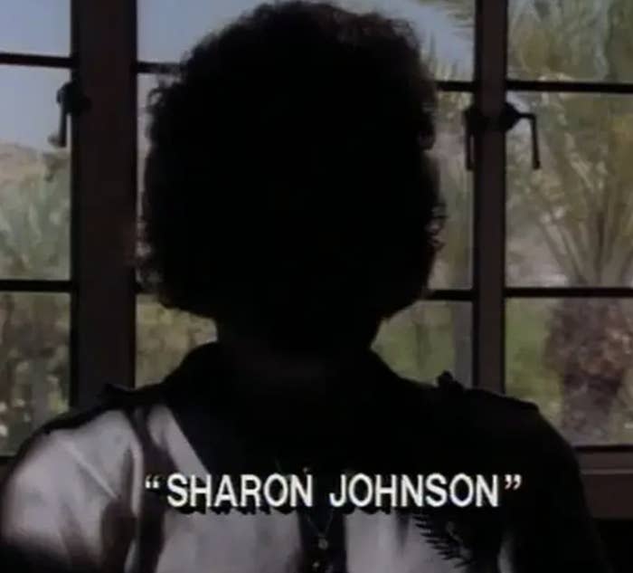 Silhouetted person by a window with the name "Sharon Johnson" onscreen