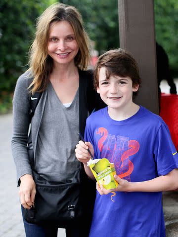 <p>Sandy Huffaker/Corbis/Getty</p> Calista Flockhart with her son Liam while at Legoland California on August 24, 2012.