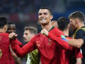 <p>(Almost) winners are grinners: Ronaldo is all smiles after scoring his stunning free kick to complete his hat-trick. (AP) </p>