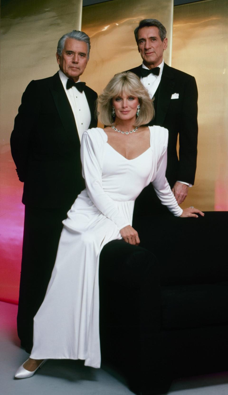 Rock Hudson along with his "Dynasty" costars in John Forsythe and Linda Evans.