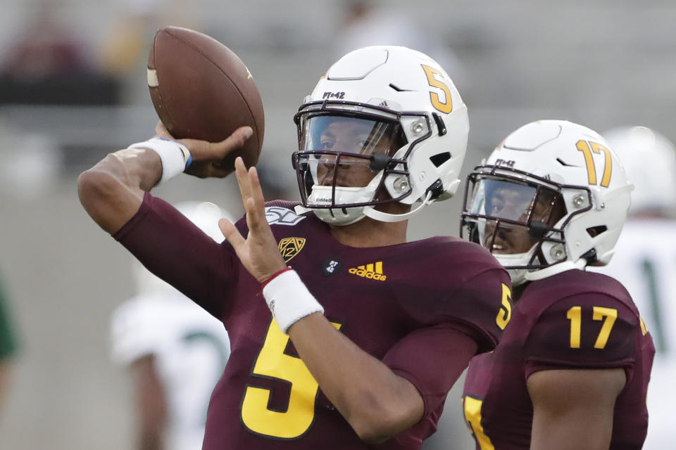 Arizona State quarterback Jayden Daniels (5) warms up for the team's NCAA college football game against Sacramento State, Friday, Sept. 6, 2019, in Tempe, Ariz. (AP Photo/Matt York)