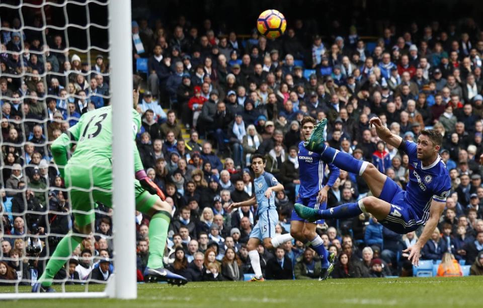 Britain Football Soccer - Manchester City v Chelsea - Premier League - Etihad Stadium - 3/12/16 Chelsea's Gary Cahill scores an own goal and the first goal for Manchester City Action Images via Reuters / Jason Cairnduff Livepic EDITORIAL USE ONLY. No use with unauthorized audio, video, data, fixture lists, club/league logos or "live" services. Online in-match use limited to 45 images, no video emulation. No use in betting, games or single club/league/player publications. Please contact your account representative for further details.