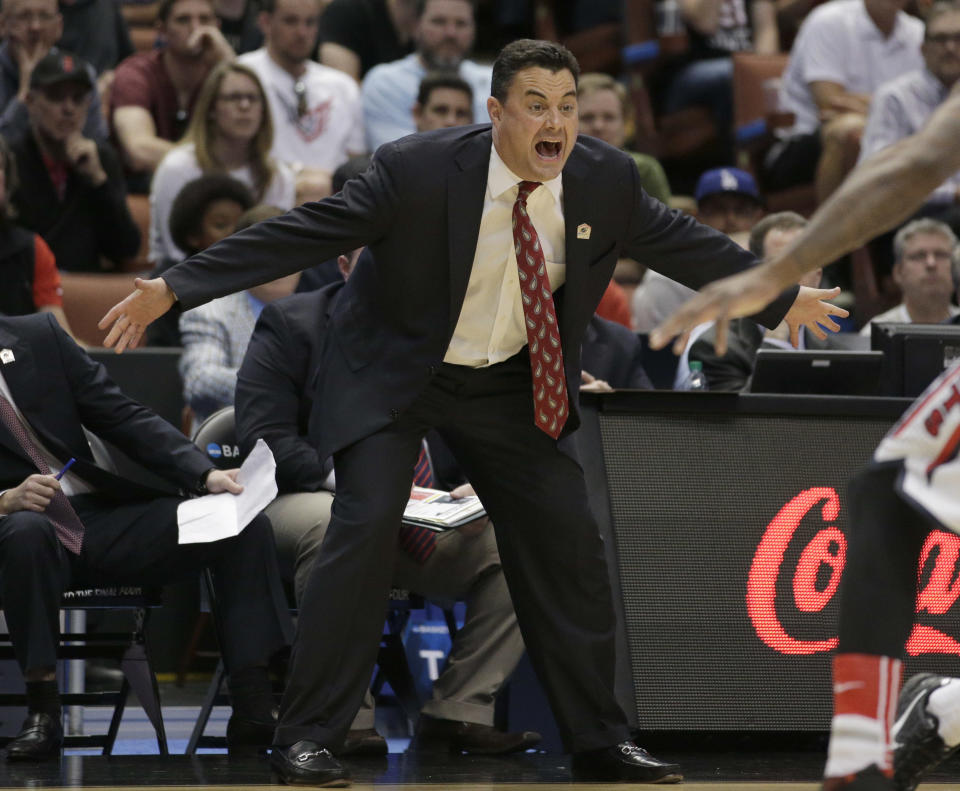 Arizona coach Sean Miller yells during the first half against San Diego State in an NCAA men's college basketball tournament regional semifinal, Thursday, March 27, 2014, in Anaheim, Calif. (AP Photo/Jae C. Hong)