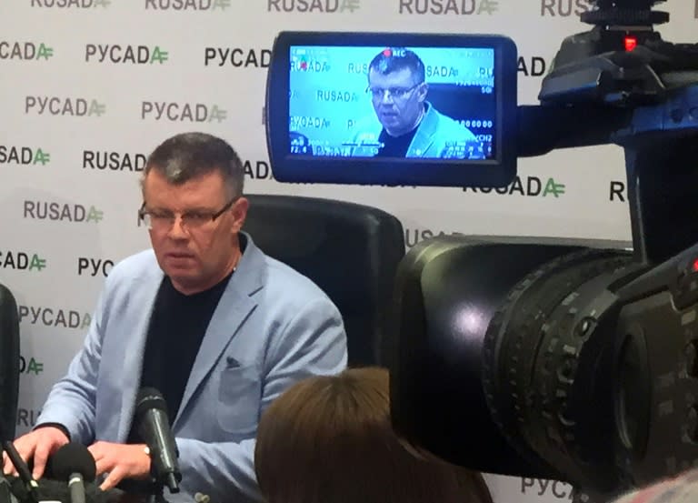 A picture taken and released on November 10, 2015 by Russia's anti-doping agency (RUSADA) shows Nikita Kamaev answering journalists' questions during a press conference in Moscow on November 10, 2015