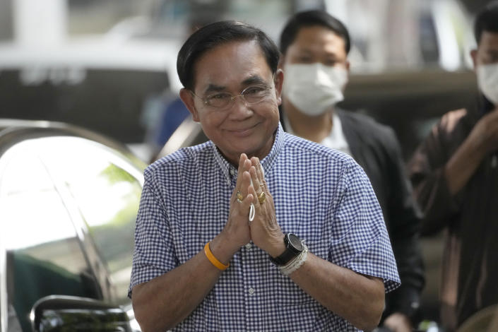 Thailand's Prime Minister Prayuth Chan-ocha arrives to cast his vote during a general election at a polling station in Bangkok, Thailand, Sunday, May 14, 2023. (AP Photo/Sakchai Lalit)