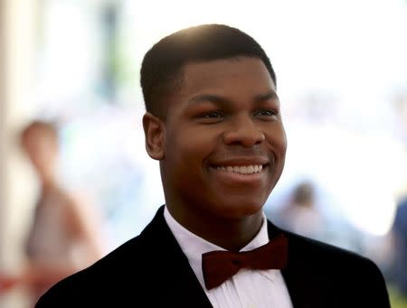 British actor John Boyega arrives for the Metropolitan Museum of Art Costume Institute Gala 2015 celebrating the opening of "China: Through the Looking Glass," in Manhattan, New York May 4, 2015. REUTERS/Andrew Kelly