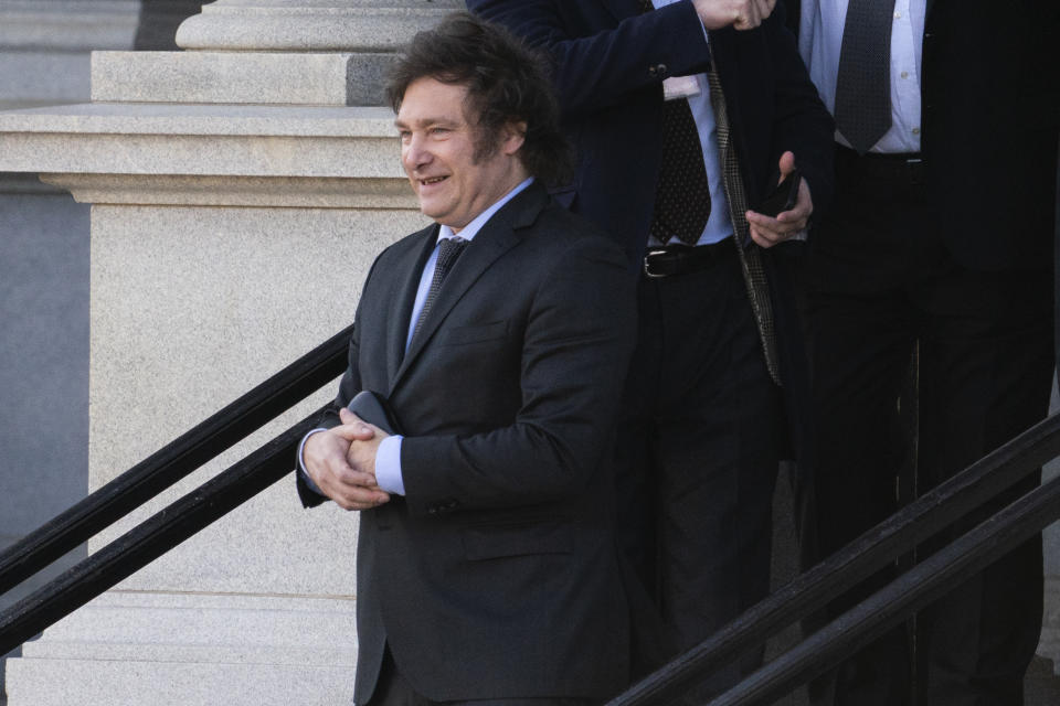 Argentina's President-elect Javier Milei walks down the steps of the Eisenhower Executive Office Building on the White House campus after a meeting with National Security Adviser Jake Sullivan, Tuesday, Nov. 28, 2023, in Washington. (AP Photo/Evan Vucci)