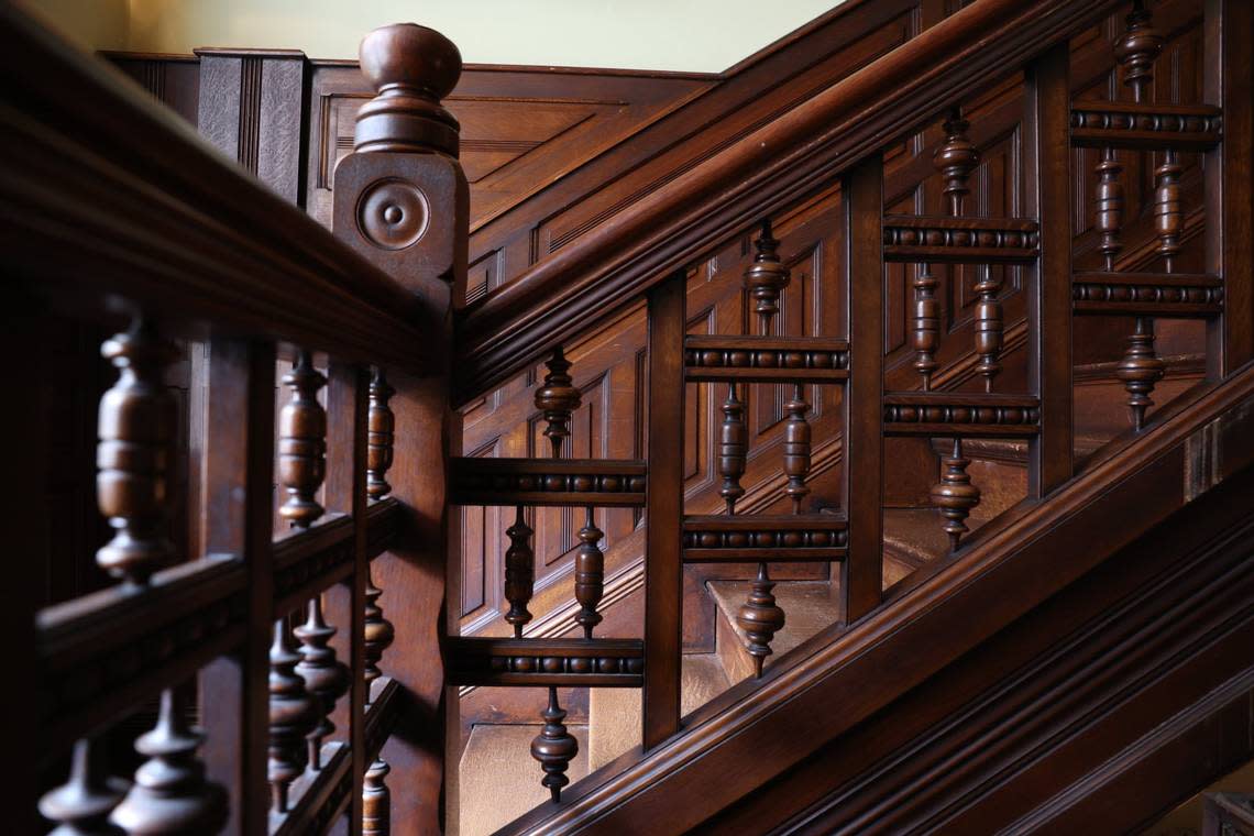 Detailing sits on the staircase bannister in Burke Mansion on Monday, Aug. 5, 2024, in Macon, Georgia. “Merchant Prince” of Macon T.C.Burke built the home in 1887, which has now been converted into a bed and breakfast.